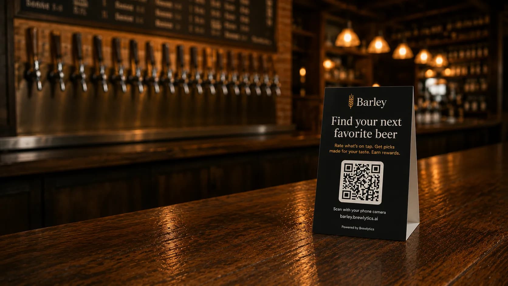 A long brass tap wall in a warm taproom with a Barley table tent on the bar inviting customers to scan, rate what's on tap, and earn rewards.